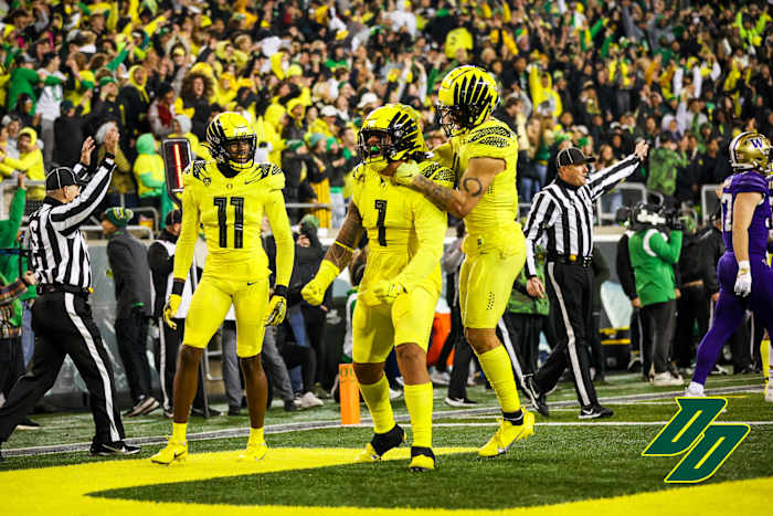 Noah Sewell celebrates a big play against the Washington Huskies at Autzen Stadium in Eugene.